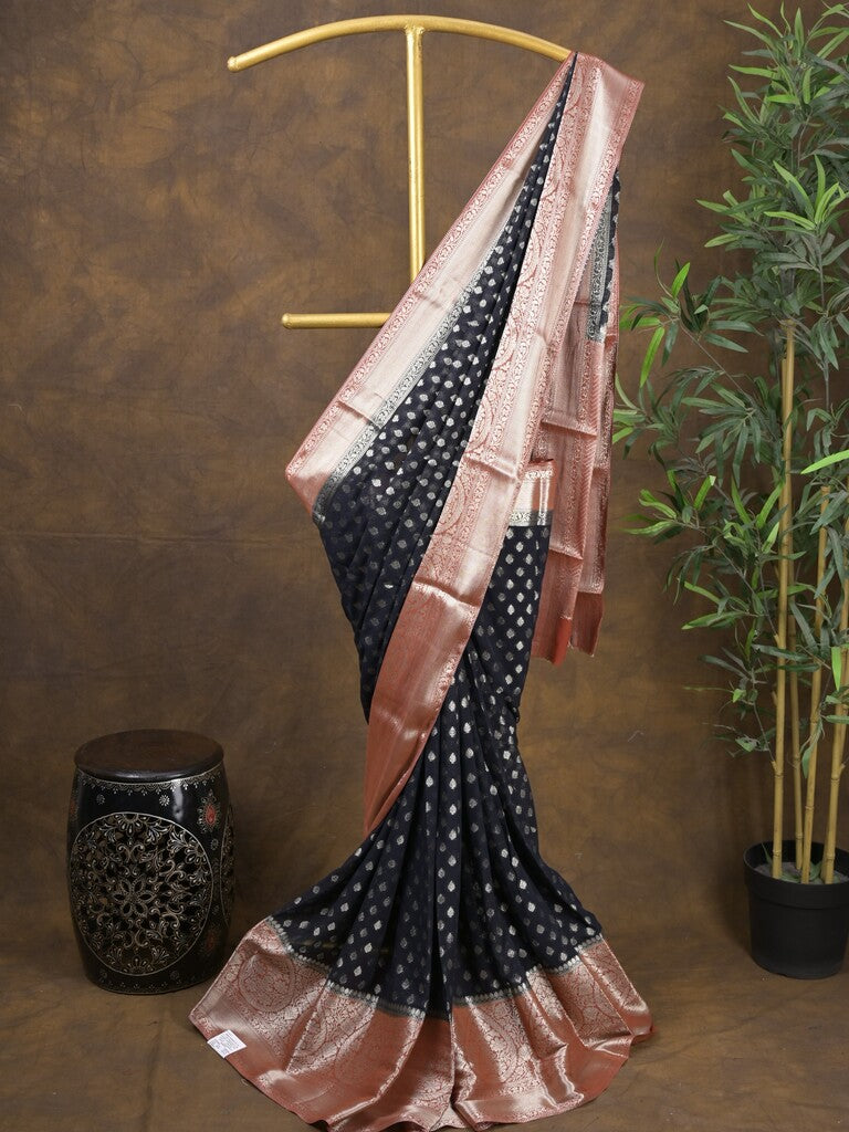 Georgette fancy saree black color allover zari motifs & zari border with rich pallu and attached plain blouse