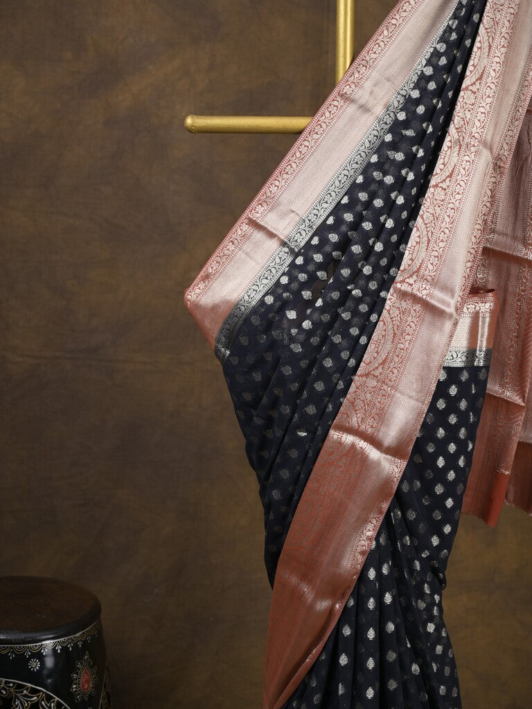 Georgette fancy saree black color allover zari motifs & zari border with rich pallu and attached plain blouse