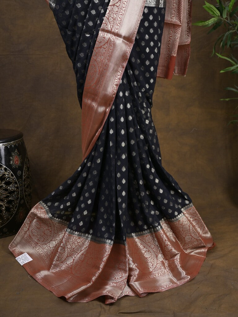Georgette fancy saree black color allover zari motifs & zari border with rich pallu and attached plain blouse