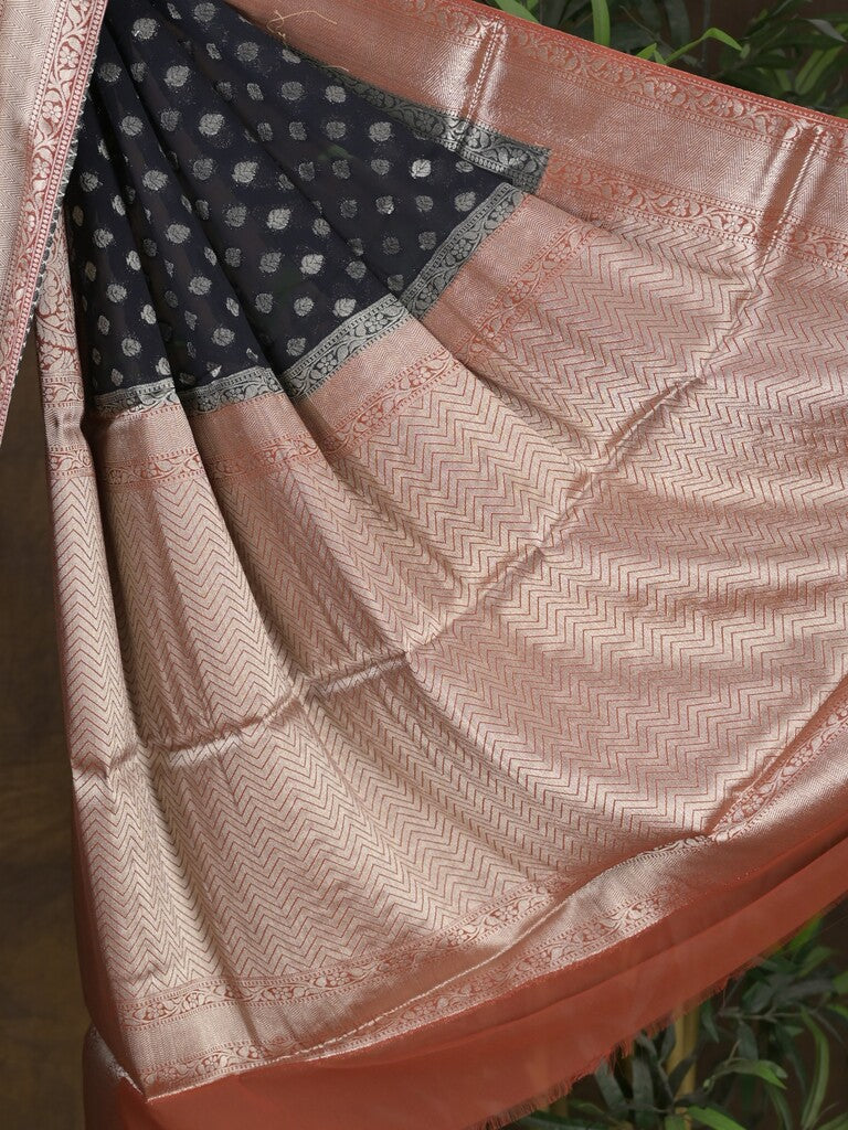 Georgette fancy saree black color allover zari motifs & zari border with rich pallu and attached plain blouse