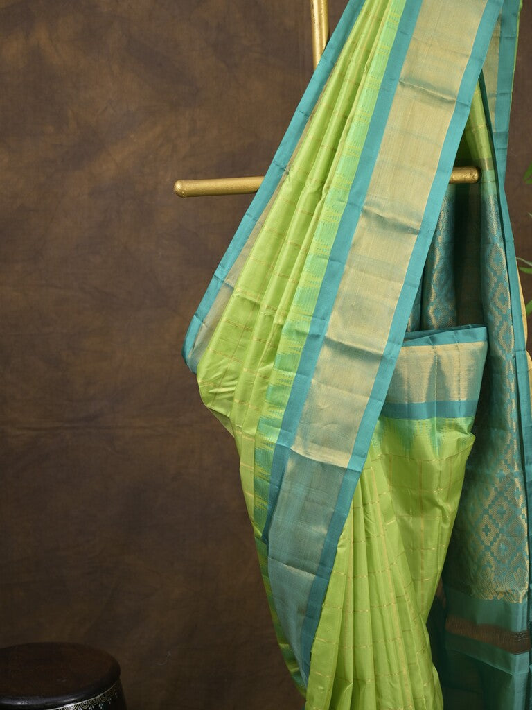 Gadwal pattu saree parrot green color allover zari weaves & kanchi border with rich pallu and contrast plain blouse
