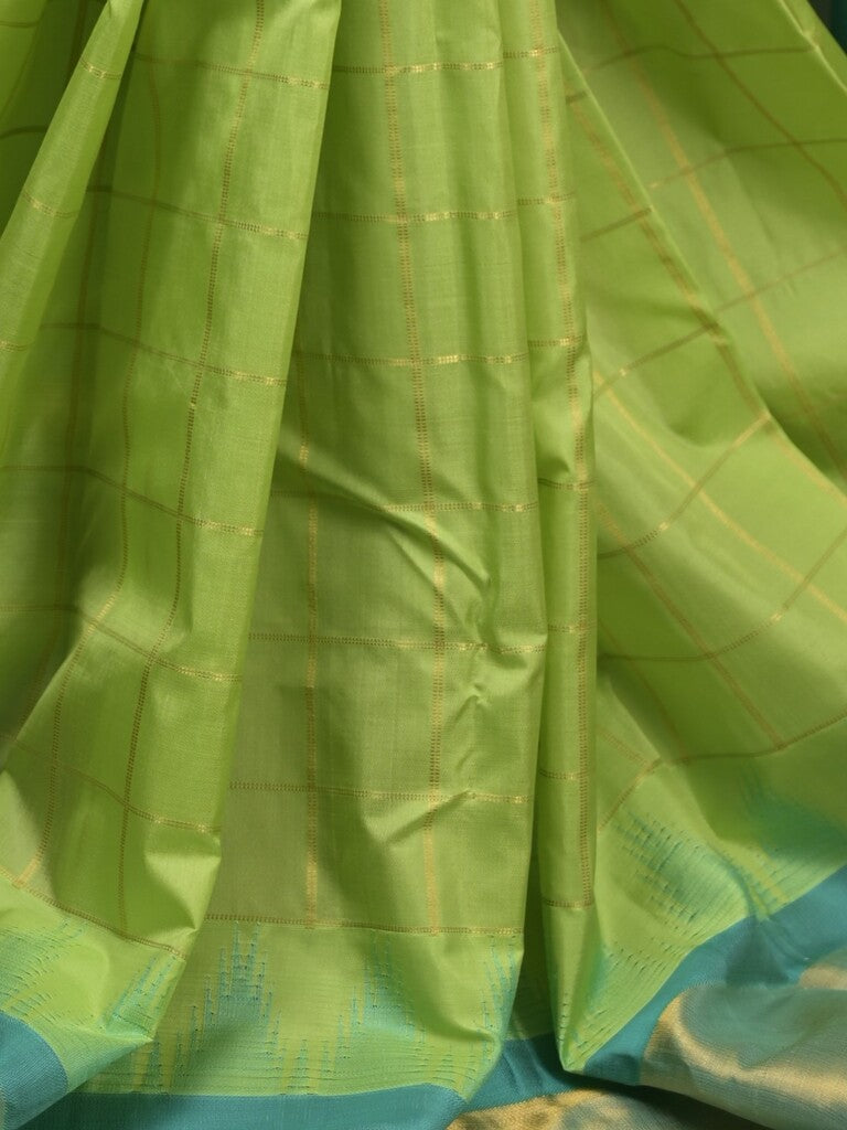 Gadwal pattu saree parrot green color allover zari weaves & kanchi border with rich pallu and contrast plain blouse