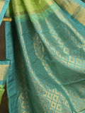 Gadwal pattu saree parrot green color allover zari weaves & kanchi border with rich pallu and contrast plain blouse