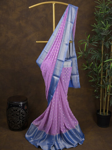 Georgette fancy saree light purple color allover zari motifs & zari border with rich pallu and attached plain blouse