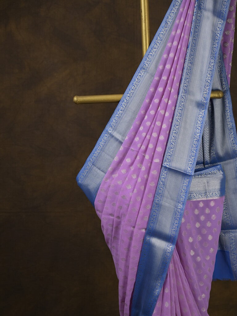 Georgette fancy saree light purple color allover zari motifs & zari border with rich pallu and attached plain blouse