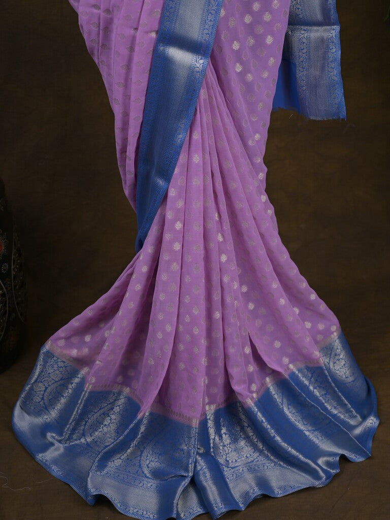 Georgette fancy saree light purple color allover zari motifs & zari border with rich pallu and attached plain blouse