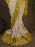 Georgette fancy saree light cream color allover zari motifs & zari border with rich pallu and attached plain blouse