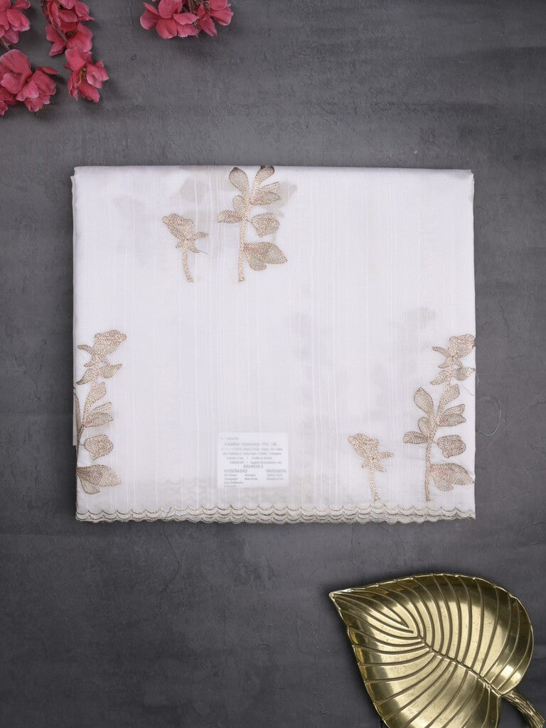 Tussar fancy saree white color allover weaves with cutwork border and running pallu & plain blouse