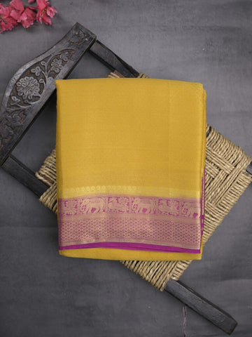 Georgette fancy saree golden yellow color allover weaves & zari border with rich pallu and plain blouse