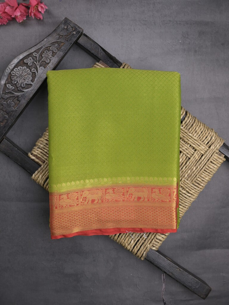 Georgette fancy saree parrot green color allover weaves & zari border with rich pallu and plain blouse