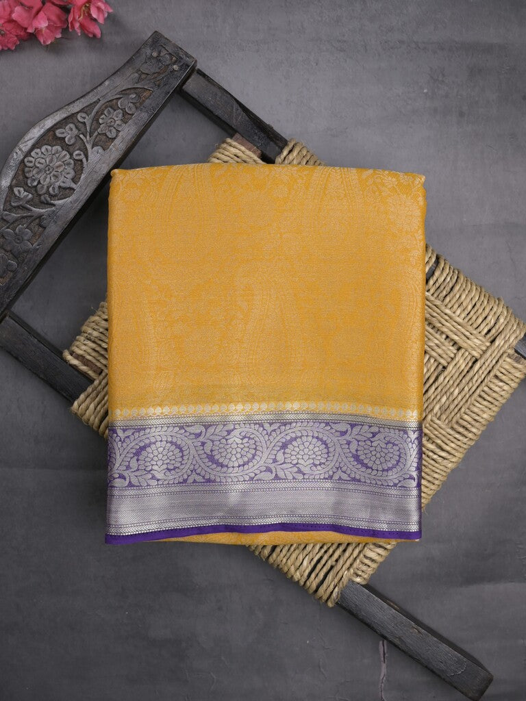Georgette fancy saree golden yellow color allover weaves & zari border with rich pallu and plain blouse