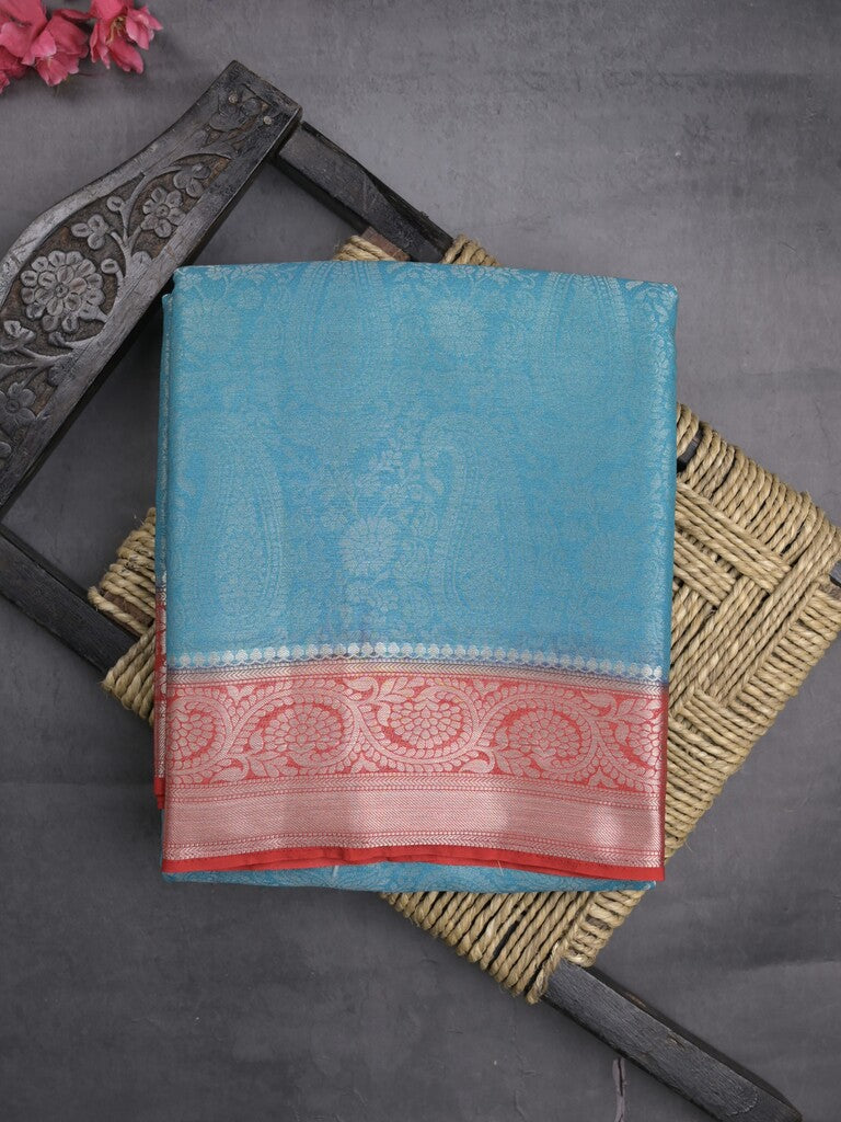 Georgette fancy saree sky blue color allover weaves & zari border with rich pallu and plain blouse