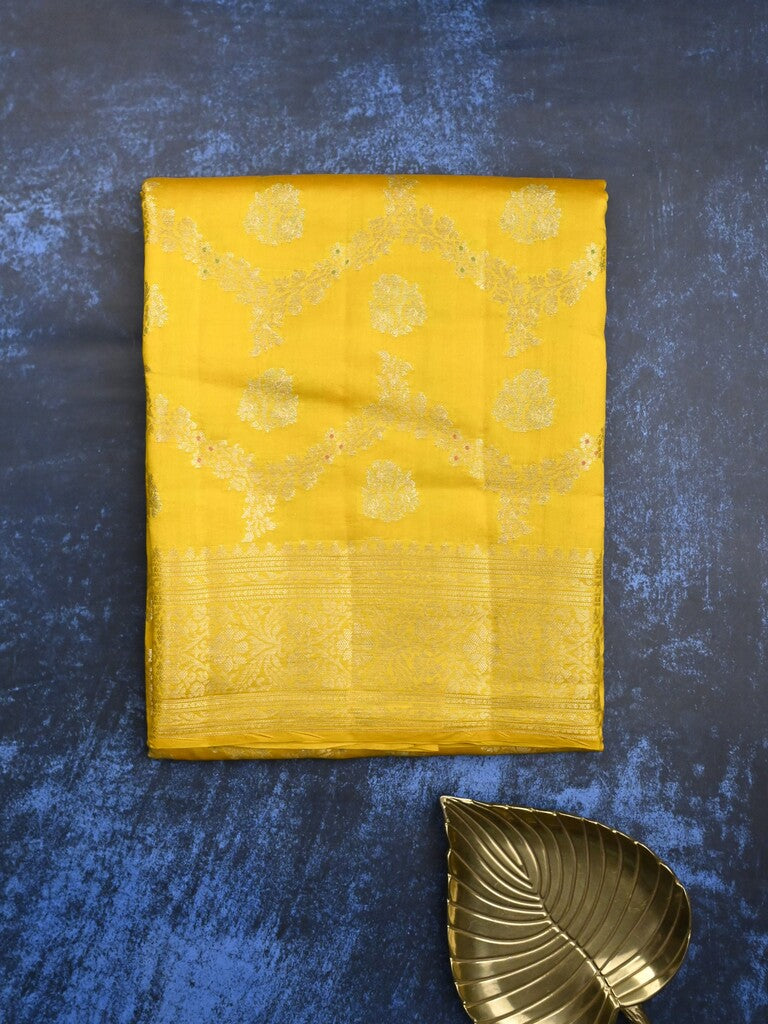 Raw mango pattu saree bright yellow color allover zari weaves & zari border with zari pallu and plain blouse