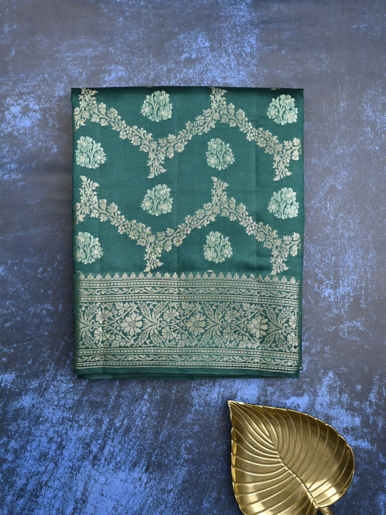 Raw mango pattu saree peacock green color allover zari weaves & zari border with zari pallu and plain blouse