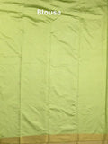 Dupion fancy saree lime green color allover zari motifs & zari border with zari pallu and plain blouse