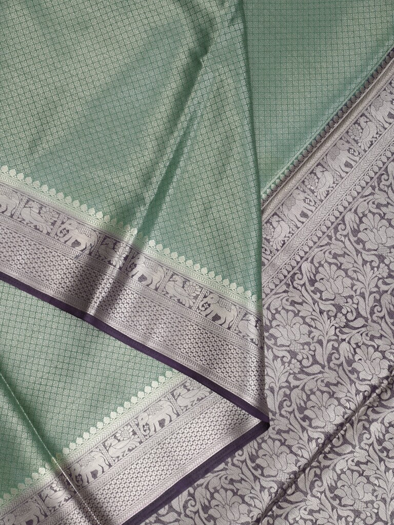 Georgette fancy saree pista green color allover weaves & zari border with rich pallu and plain blouse
