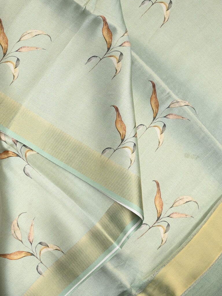 Jute tissue fancy saree pastel blue color allover prints & small zari border with self pallu and printed blouse