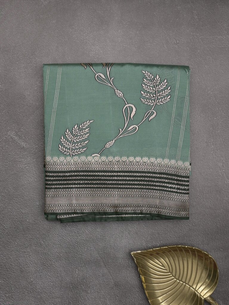 Tabby silk printed fancy saree with zari border and attached plain blouse