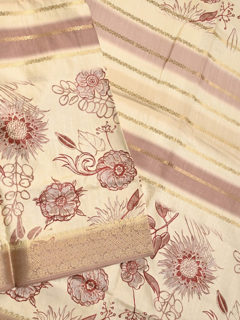 Dola silk fancy saree cream and peach color allover prints & zari border with printed pallu and printed blouse