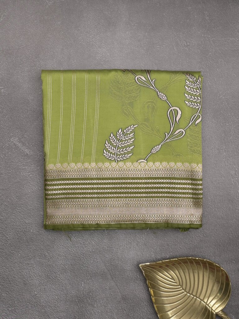 Tabby silk printed fancy saree with zari border and attached plain blouse