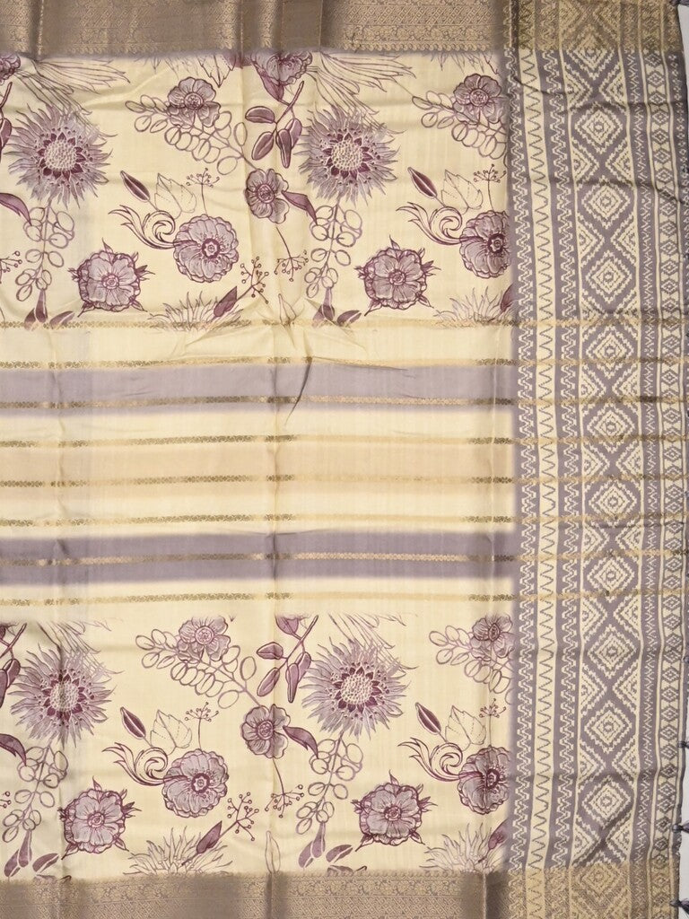 Dola silk fancy saree cream and purple color allover prints & zari border with printed pallu and printed blouse