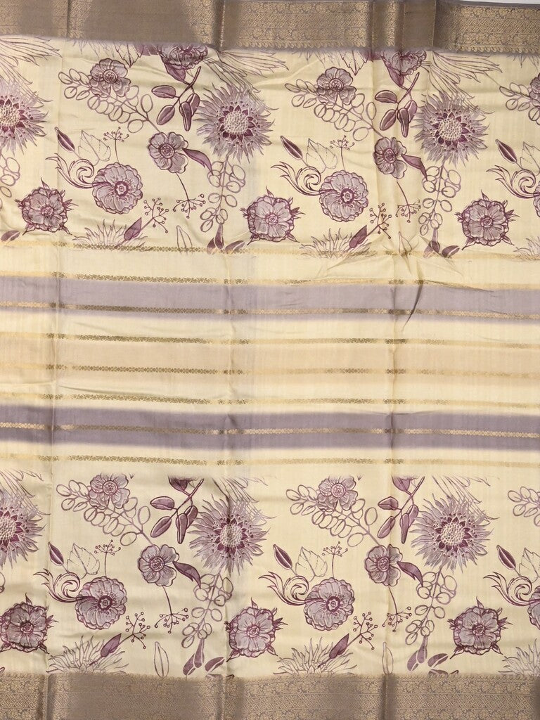 Dola silk fancy saree cream and purple color allover prints & zari border with printed pallu and printed blouse