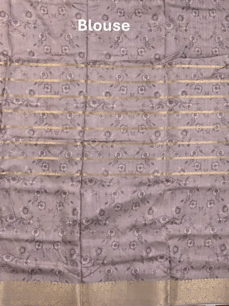 Dola silk fancy saree cream and purple color allover prints & zari border with printed pallu and printed blouse