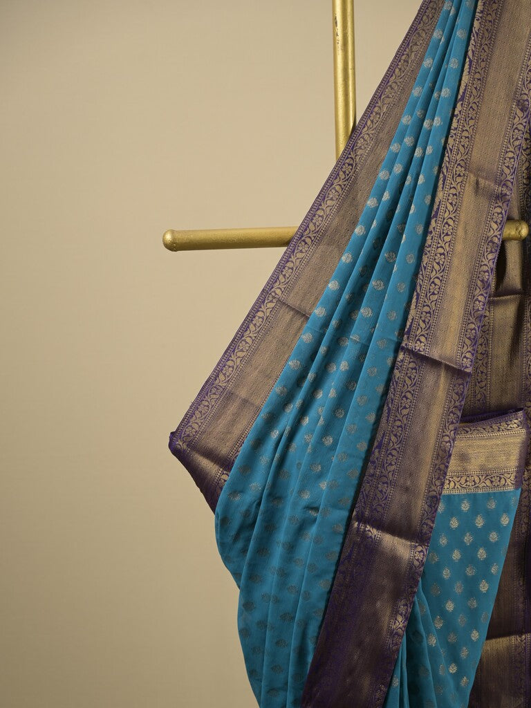 Georgette fancy saree blue color allover zari motifs & zari border with rich pallu and attached plain blouse