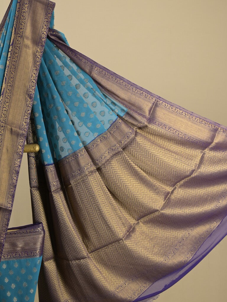 Georgette fancy saree blue color allover zari motifs & zari border with rich pallu and attached plain blouse