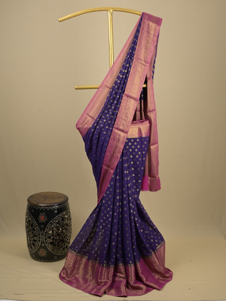 Georgette fancy saree navy blue color allover zari motifs & zari border with rich pallu and attached plain blouse