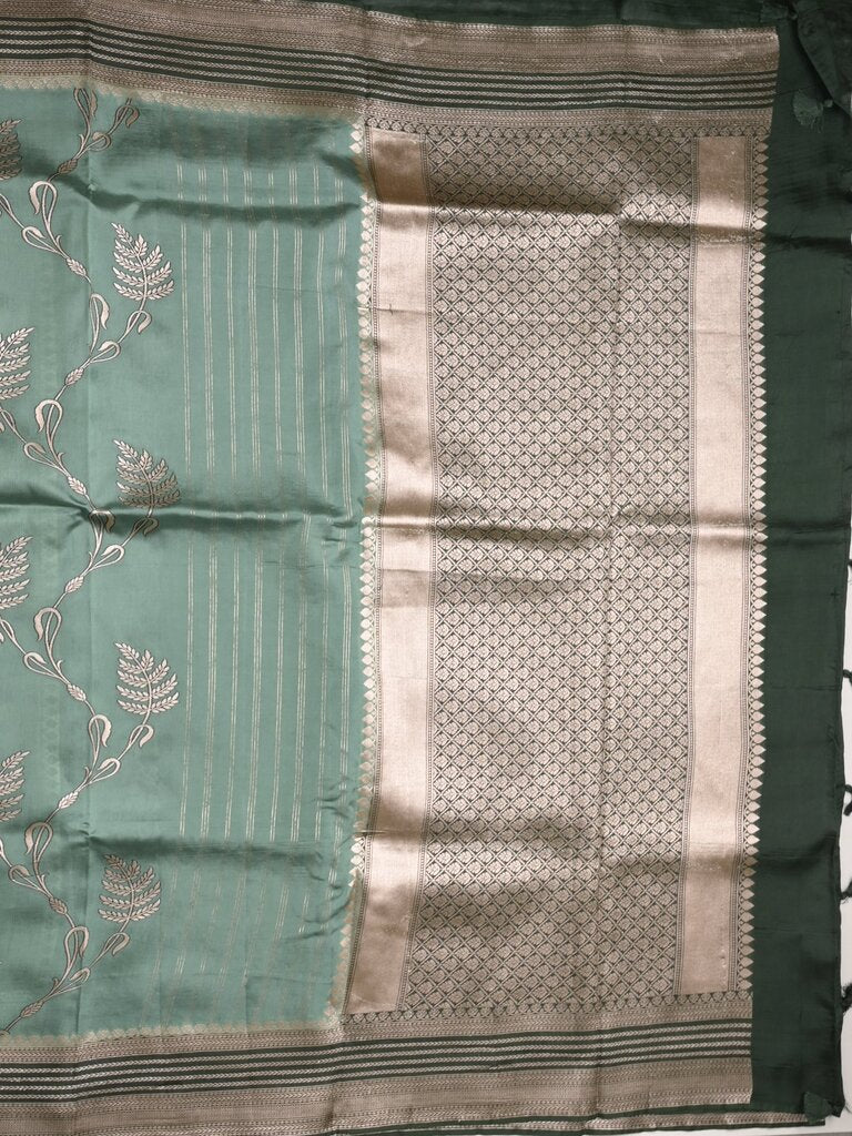 Tabby silk printed fancy saree with zari border and attached plain blouse