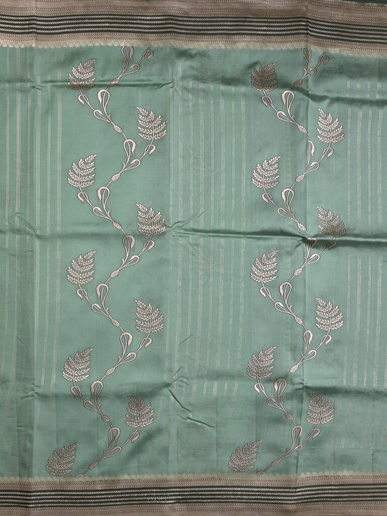 Tabby silk printed fancy saree with zari border and attached plain blouse