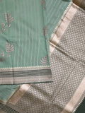 Tabby silk printed fancy saree with zari border and attached plain blouse