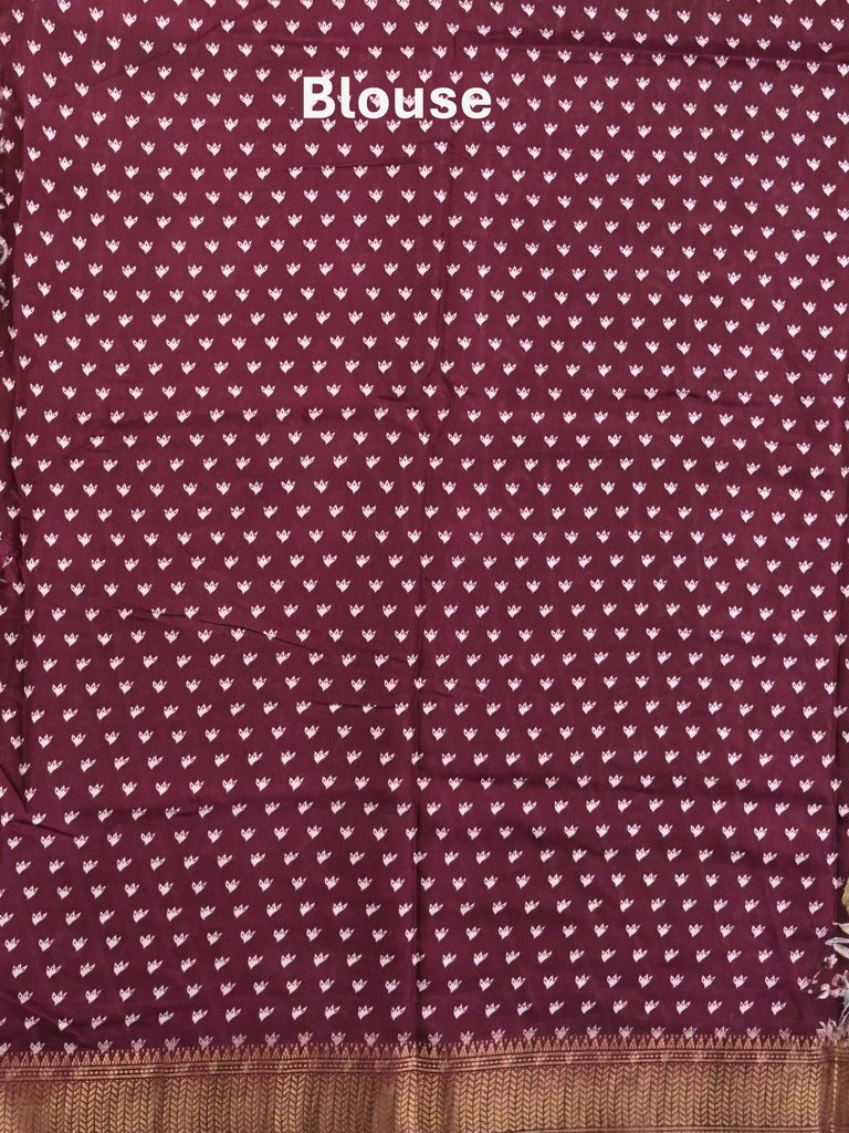 Dola silk fancy saree maroon color allover prints & zari border with printed pallu and printed blouse