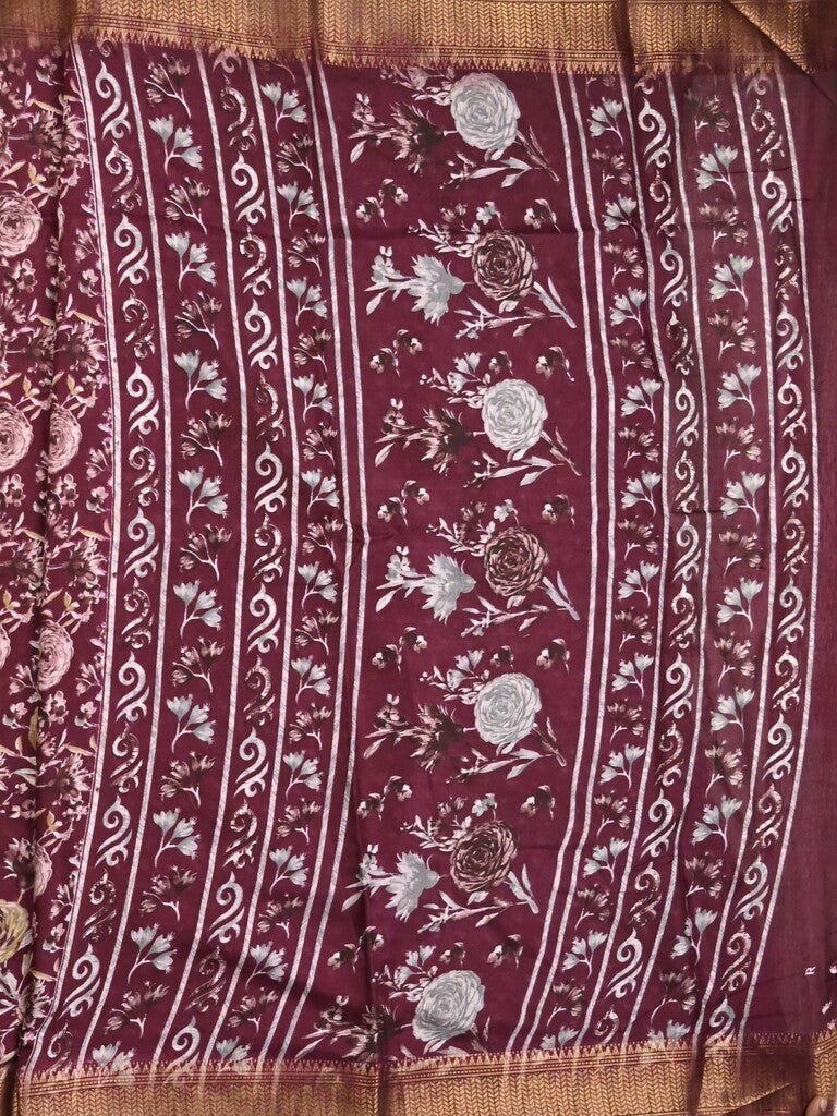 Dola silk fancy saree maroon color allover prints & zari border with printed pallu and printed blouse