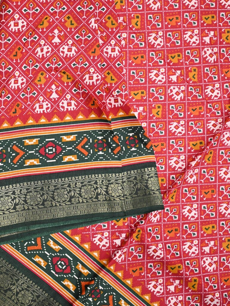 Dola silk fancy saree red color allover prints & zari border with printed pallu and printed blouse