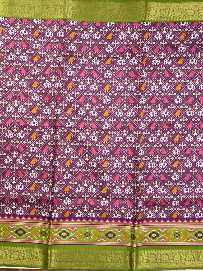 Dola silk fancy saree purple color allover prints & zari border with printed pallu and printed blouse