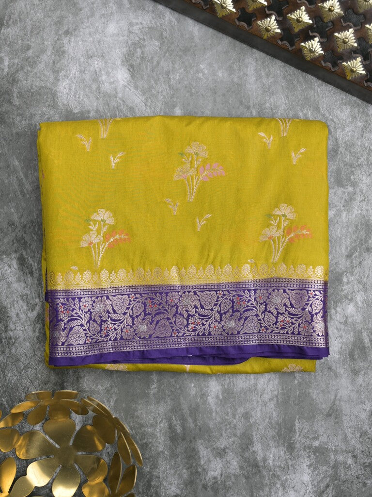 Raw mango fancy saree in golden yellow color with allover zari motifs and zari border with brocade pallu & blouse