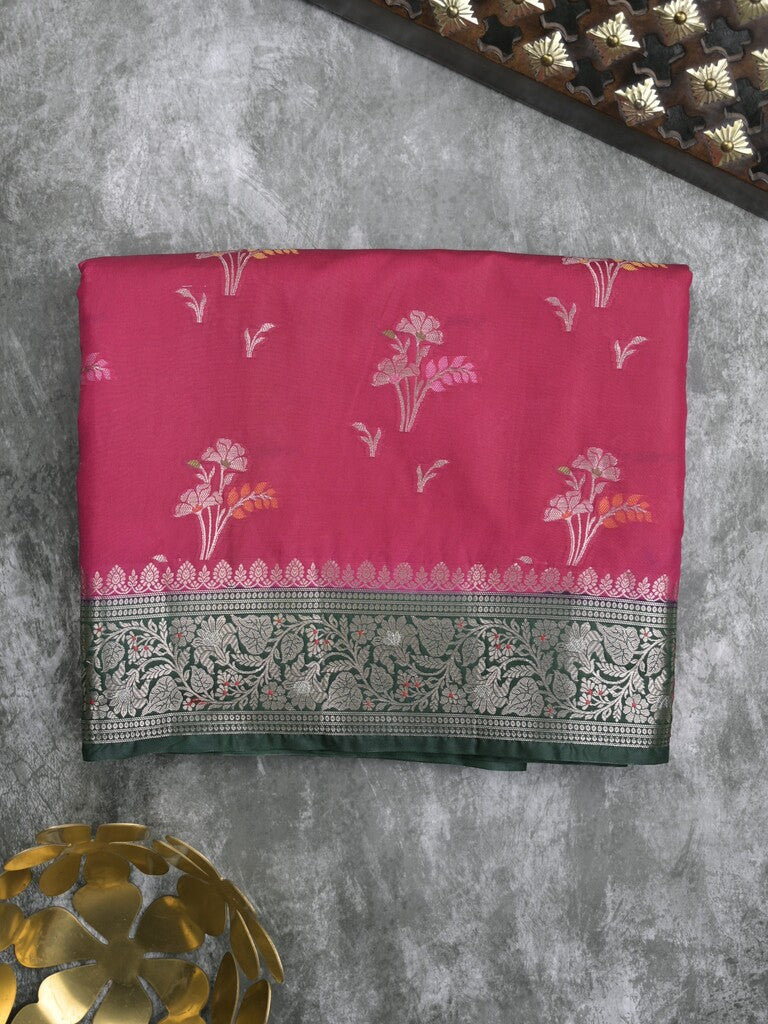Raw mango fancy saree in pink color with allover zari motifs and zari border with brocade pallu & blouse