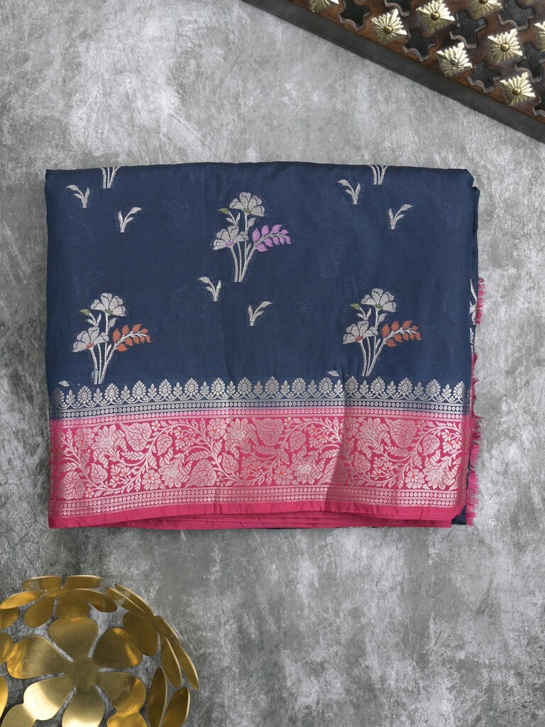 Raw mango fancy saree in navy blue color with allover zari motifs and zari border with brocade pallu & blouse