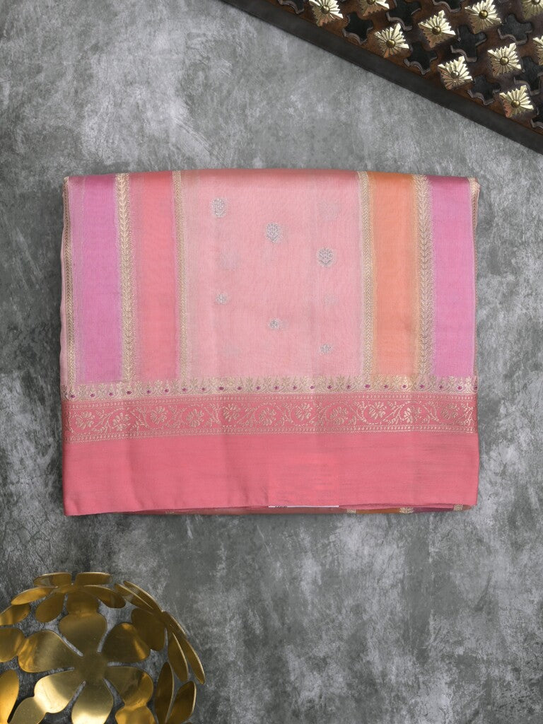 Raw mango fancy saree in light pink color with allover zari weaves and zari border with brocade pallu & blouse