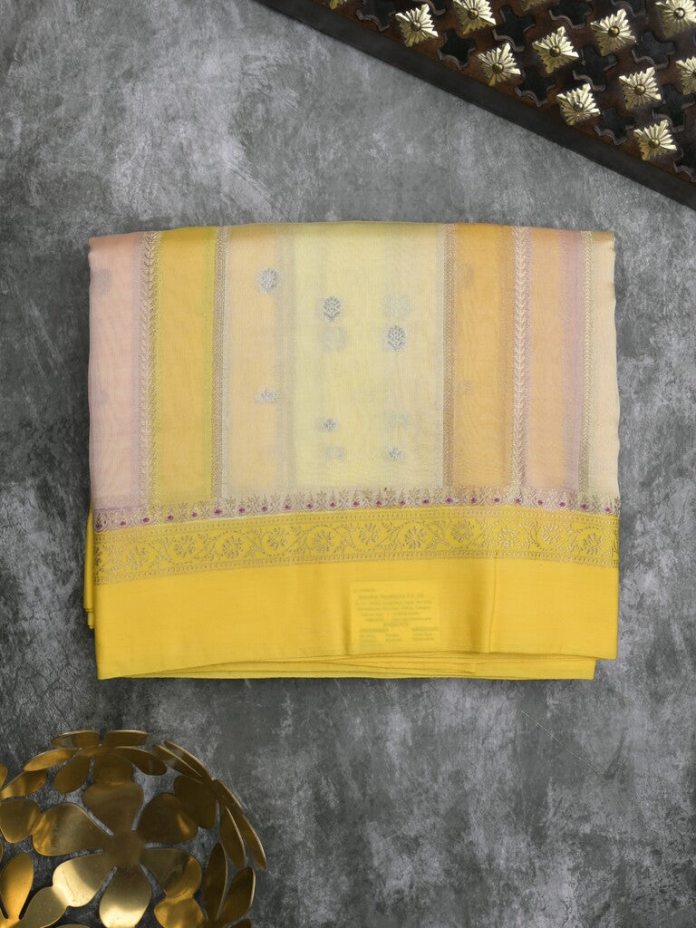 Raw mango fancy saree in cream color with allover zari weaves and zari border with brocade pallu & blouse