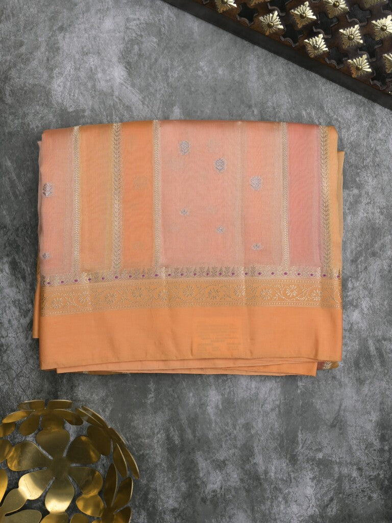 Raw mango fancy saree in peach color with allover zari weaves and zari border with brocade pallu & blouse