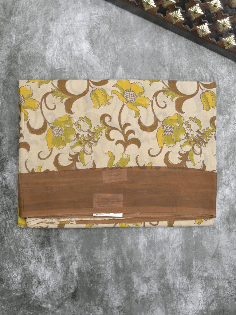 Kalamkari silk fancy saree in light cream color with contrast border & printed pallu and printed blouse