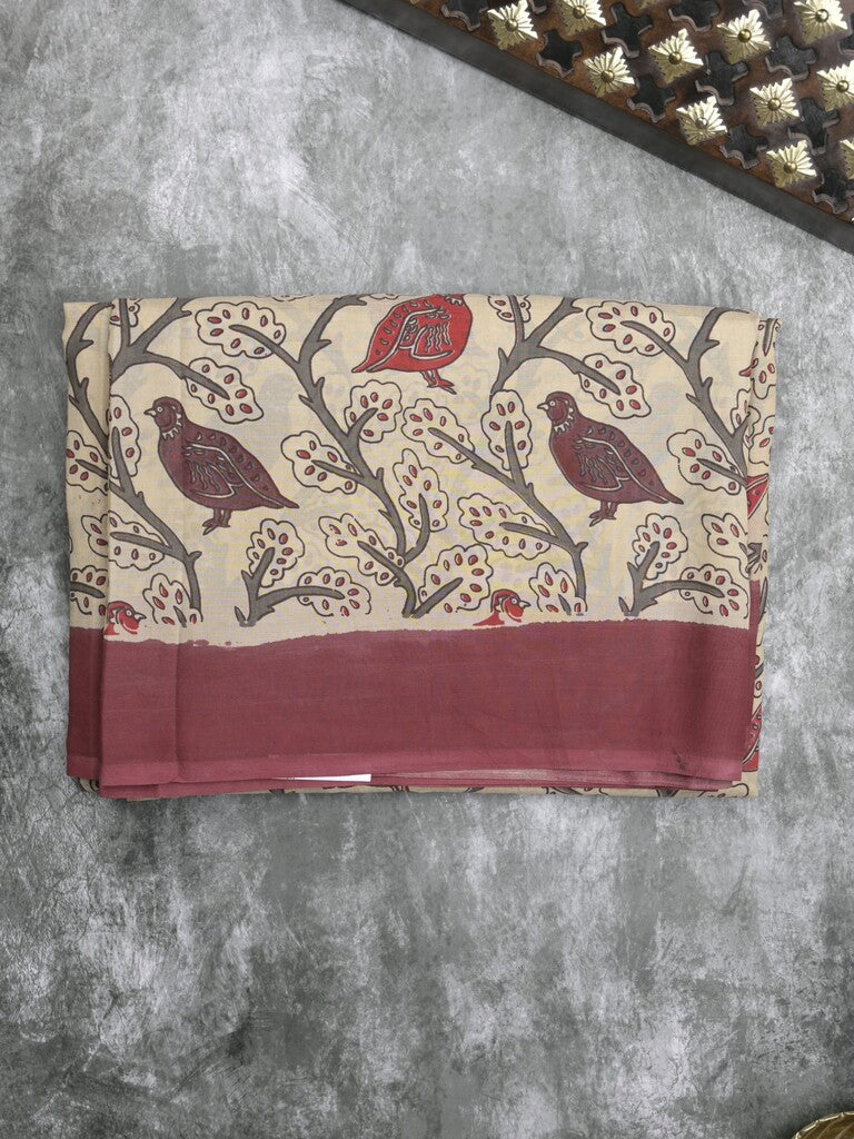 Kalamkari silk fancy saree in light cream color with contrast border & printed pallu and printed blouse