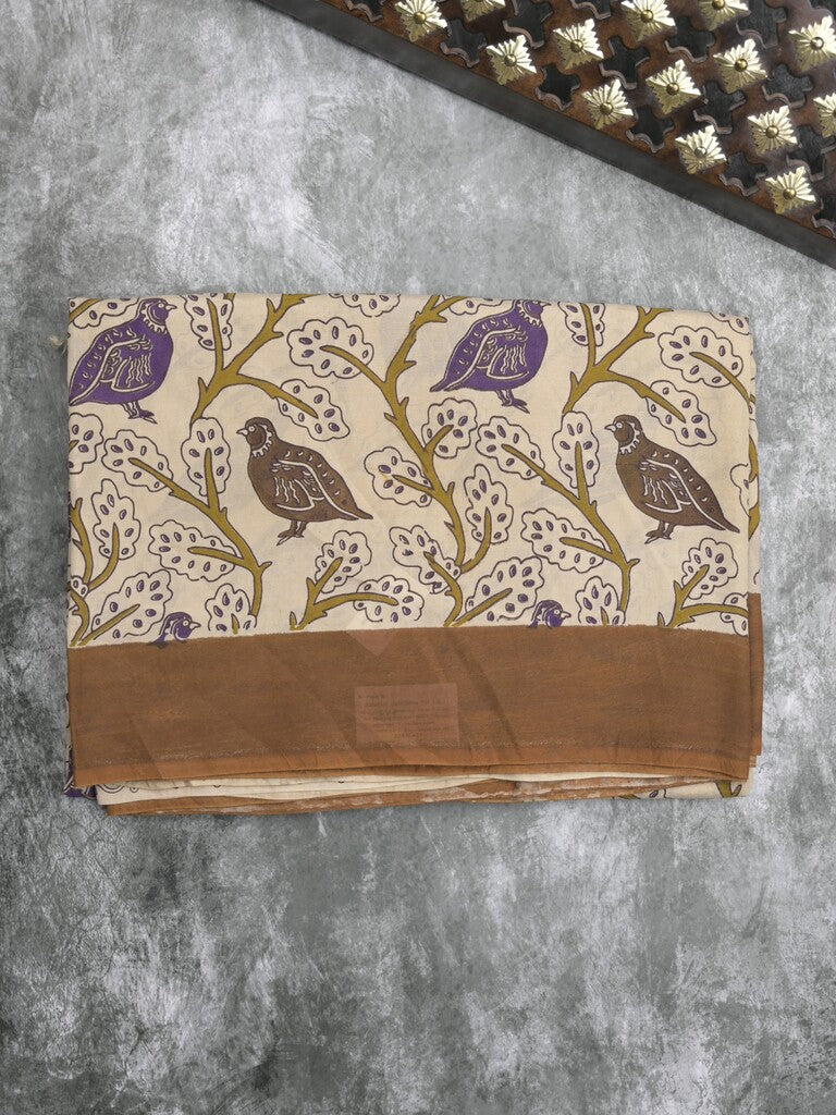 Kalamkari silk fancy saree in cream color with contrast border & printed pallu and printed blouse