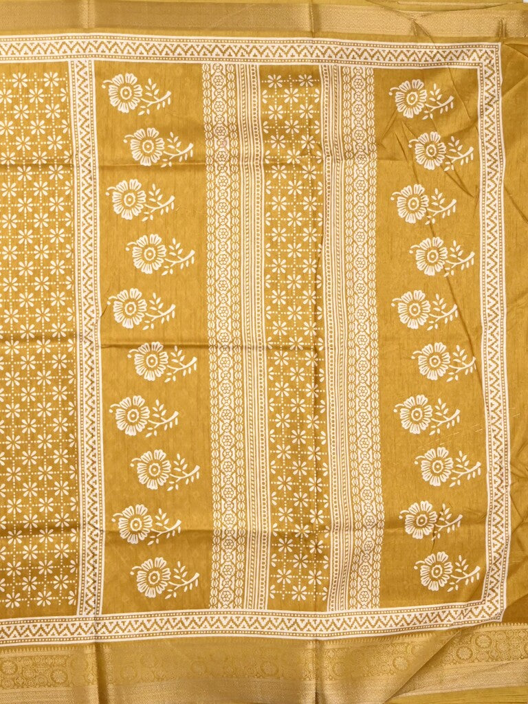 Dola silk fancy saree yellow color allover prints & zari border with printed pallu and printed blouse