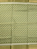 Dola silk fancy saree light green color allover prints & zari border with printed pallu and printed blouse
