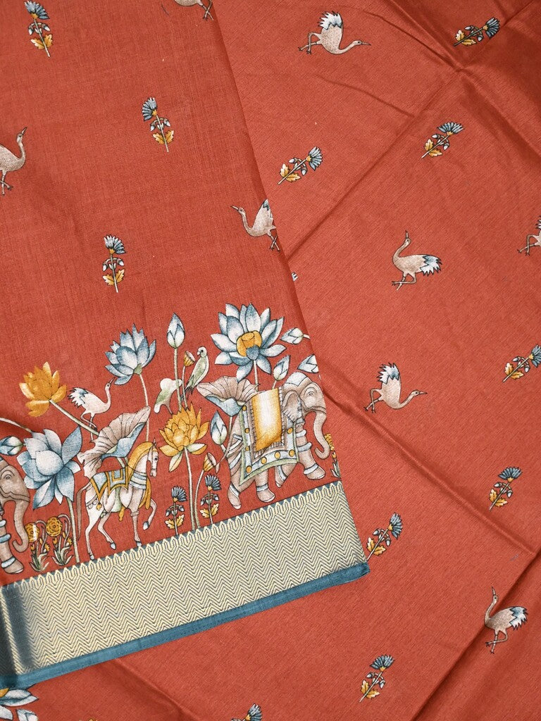 Dola silk fancy saree red color allover prints & zari border with printed pallu and printed blouse