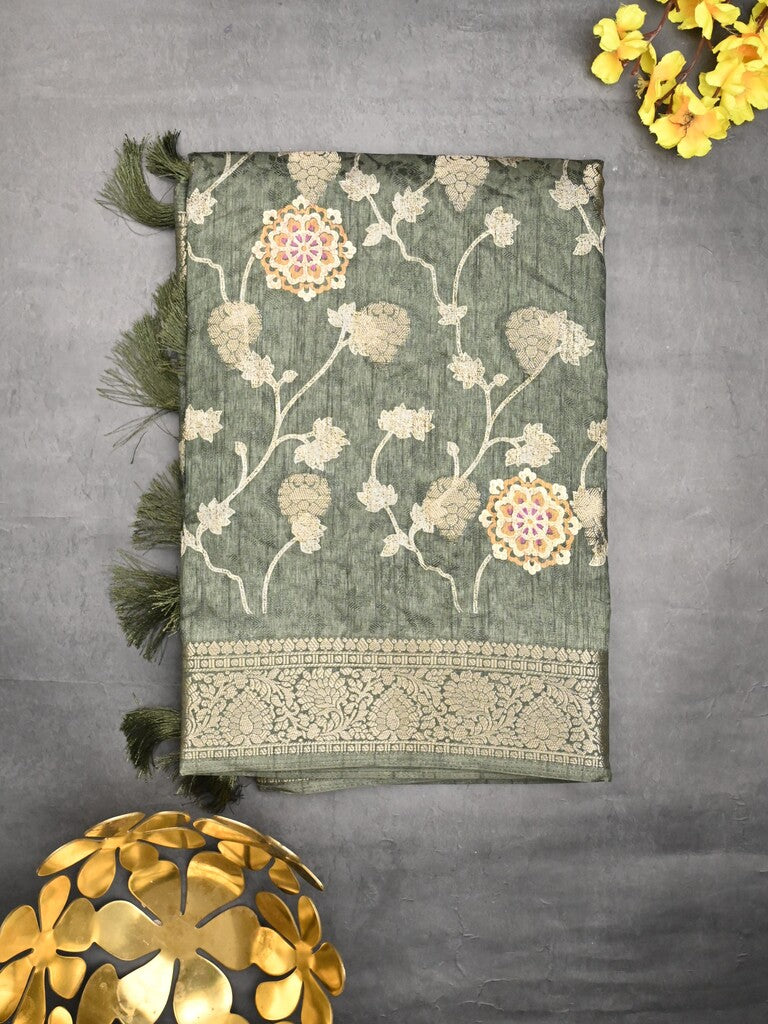 Dola silk fancy saree dark green color allover prints & zari border with printed pallu and printed blouse